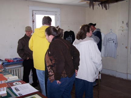 Visitors browse the PLLPS scrap book created by Kim Hammond, our Director of Paranormal Investigations
